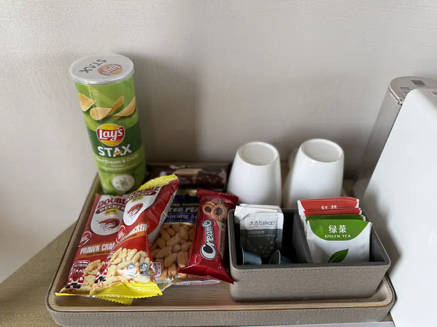 In-room welcome snacks arranged at Cupid Resort overwater villa.